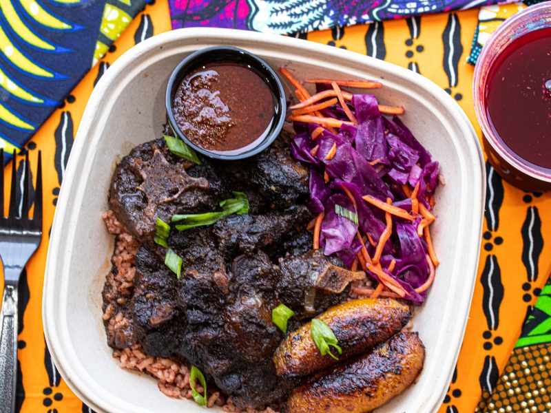 A bowl topped with braised oxtail at Hedzole in Washington, D.C.
