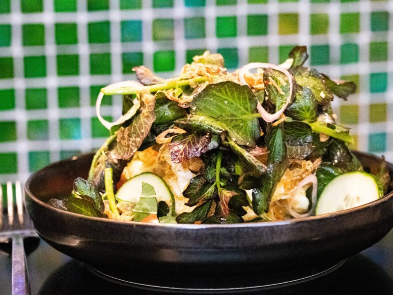Watercress salad with eggs, tomato, and shallots at Little Vietnam in Washington, D.C.