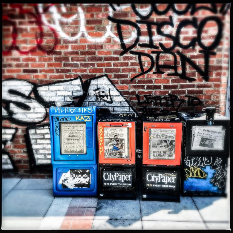 Washington City Paper street boxes on the roof of The Atlantis, a music venue in Washington D.C.
