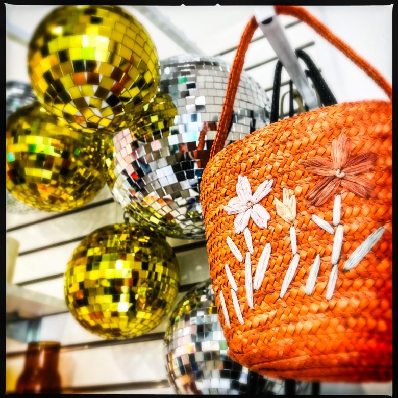 Bags and decor for sale at Relume, a gift shop on Capitol Hill