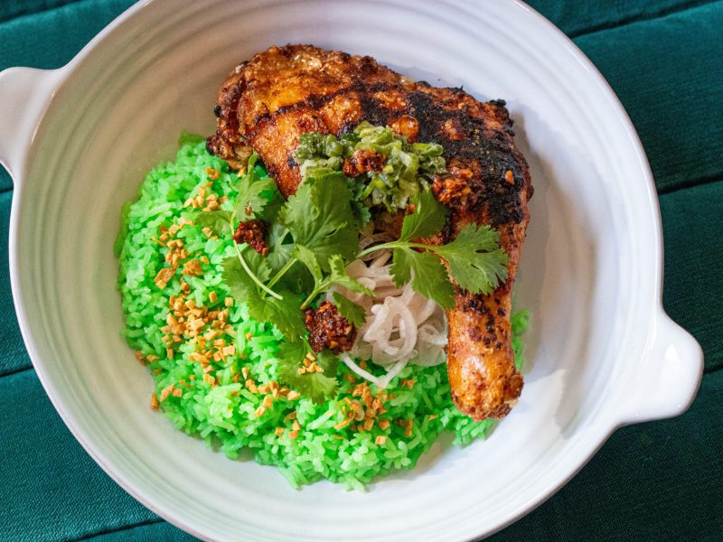 Chicken leg with coconut rice at Doki Doki BBQ in Washington, D.C.